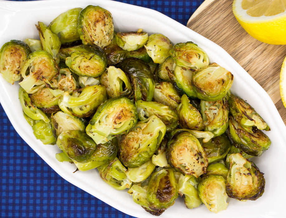 Roasted brussel sprouts are incredibly easy, vegan and gluten free. Roasting caramelizes the sprouts adding sweetness, depth of flavor and color.
