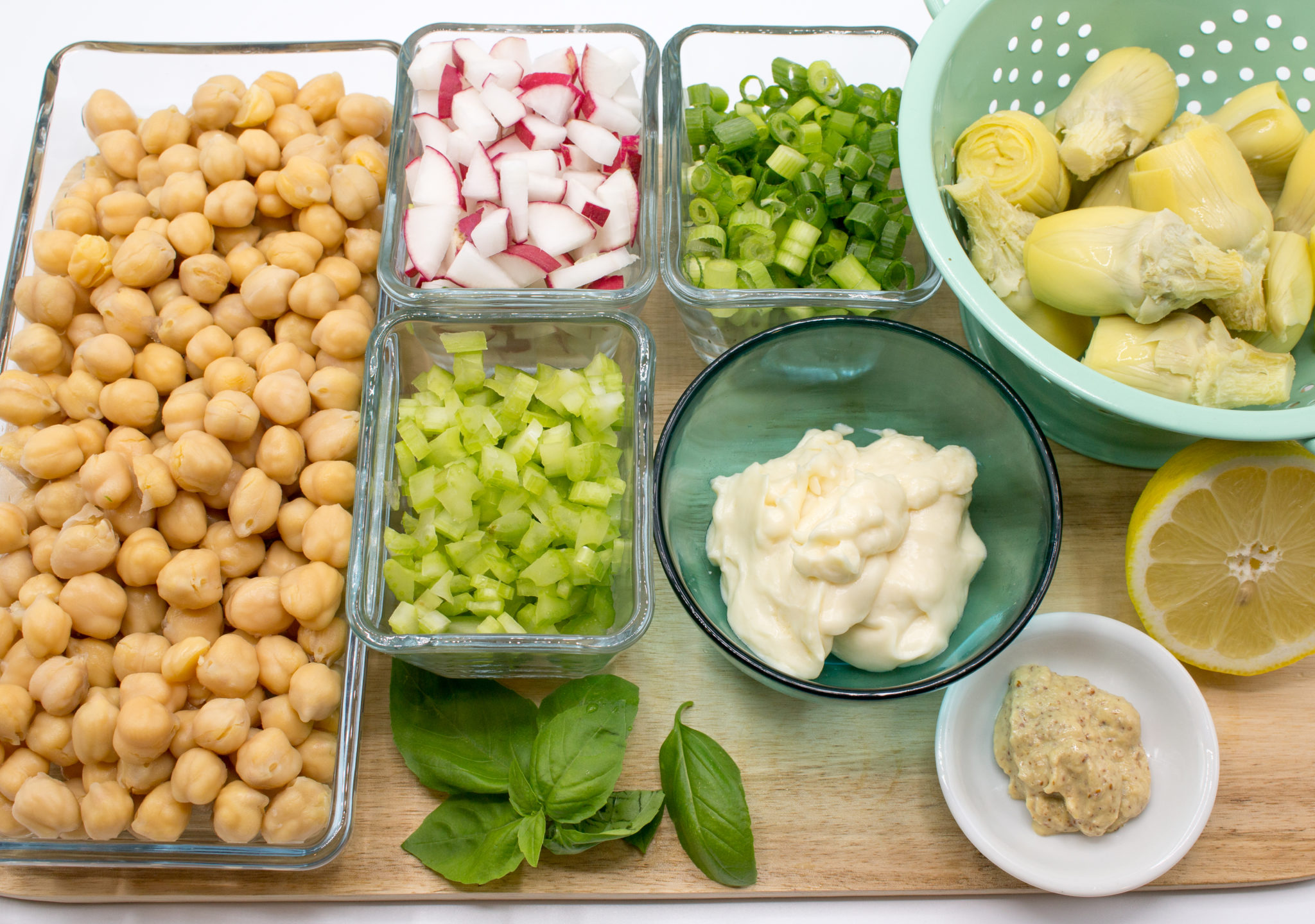 Artichoke chickpea salad is a fresh crisp treat. It is great for work or school lunches. Eat it in a bowl, lettuce cup, or on gluten-free bread.