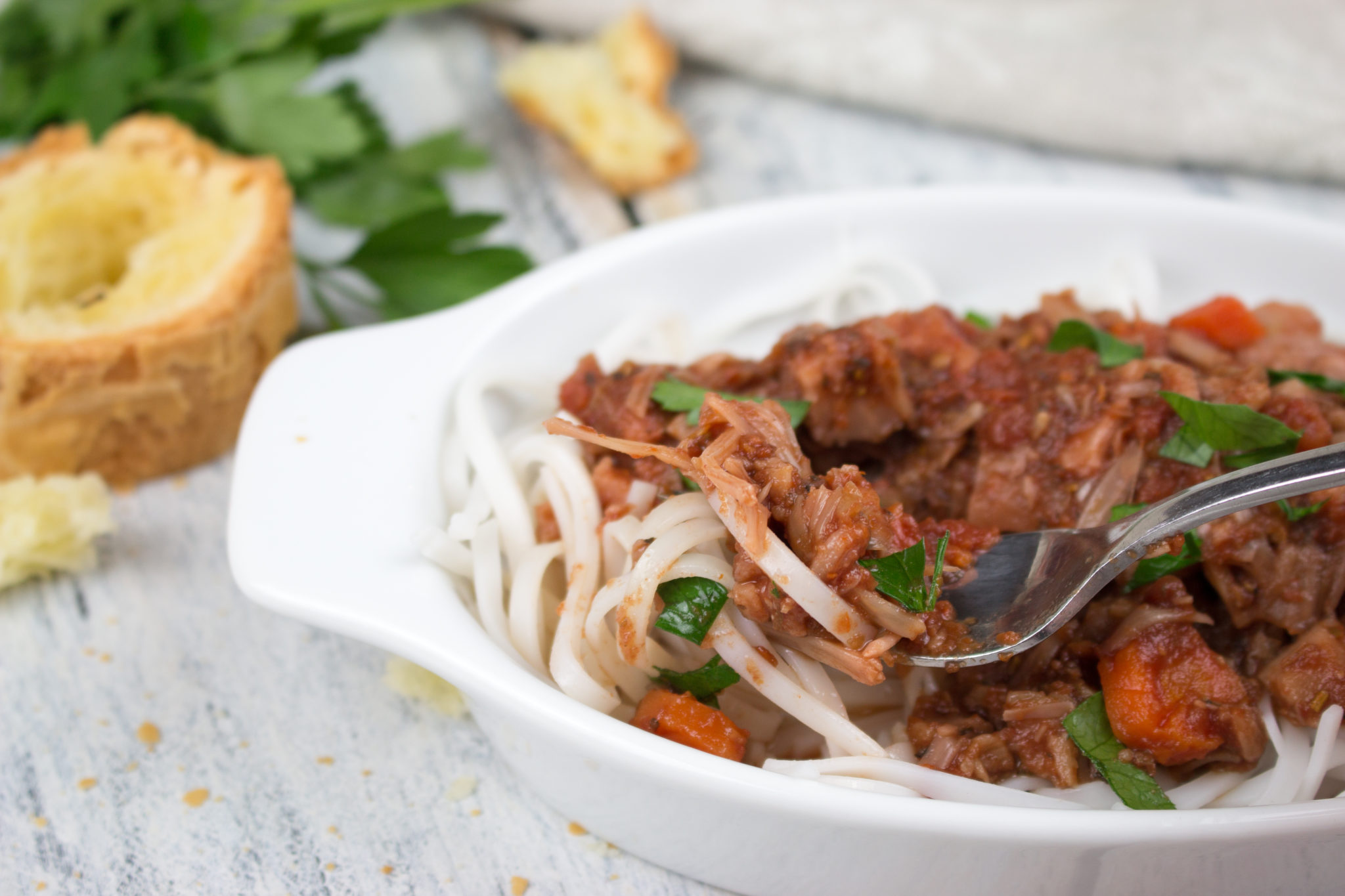 Jackfruit ragu is a vegan version of an old Italian favorite. Great made in an Instant Pot or crockpot. Can't beat a meal made with tomatoes, onions, garlic, red wine, veggies, herbs, spices and a pinch of yummy goodness! www.veganglutenfreelife.com/jackfruit-ragu/